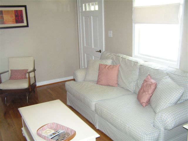 138 Webster Heights Road Roanoke, VA 24012 - Photo 3 of 14 a bedroom with a bed and a table