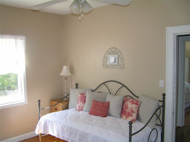 138 Webster Heights Road Roanoke, VA 24012 - Photo 8 of 14 a bedroom with a bed and a window