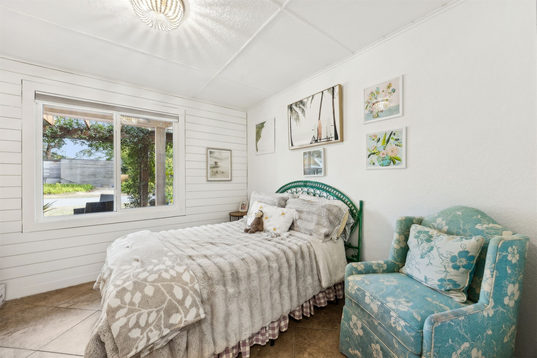 411 South 5th Street Fernandina Beach, FL 32034 - Photo 19 of 43 a bedroom with two beds and a large window