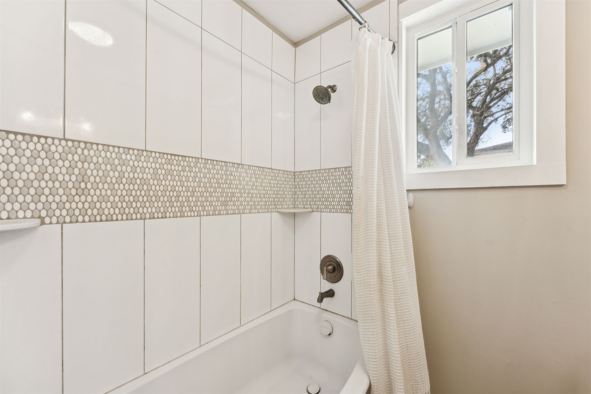 411 South 5th Street Fernandina Beach, FL 32034 - Photo 20 of 43 a bathroom with a bathtub and shower