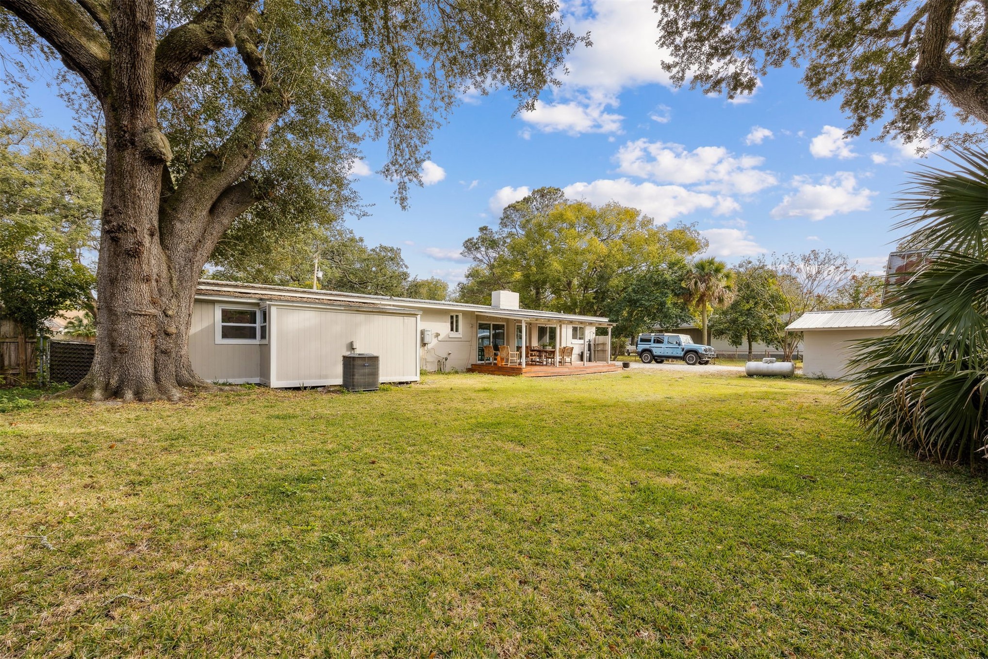 411 South 5th Street Fernandina Beach, FL 32034 - Photo 2 of 43 a front view of house with yard and trees