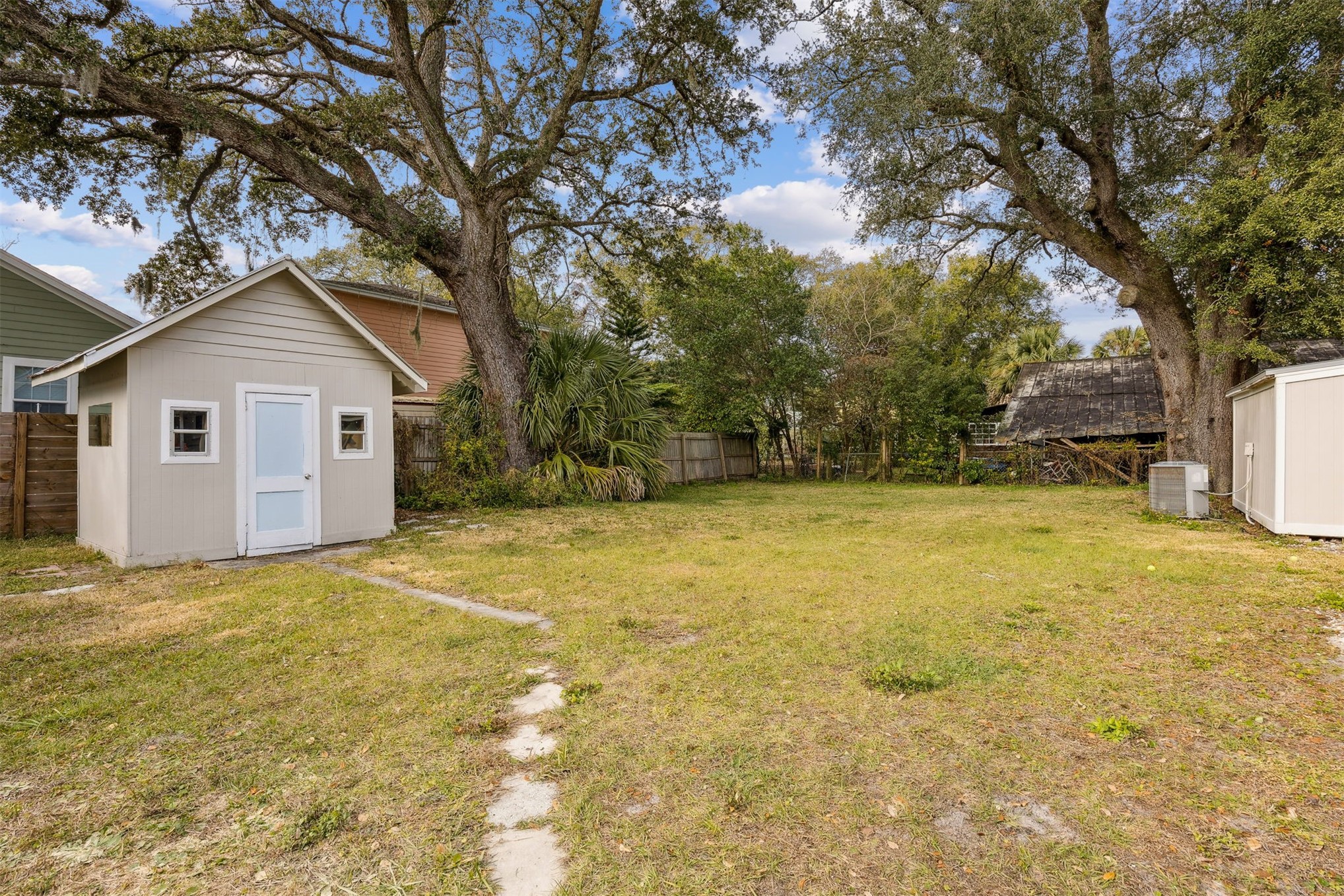 411 South 5th Street Fernandina Beach, FL 32034 - Photo 27 of 43 a view of a house with a yard