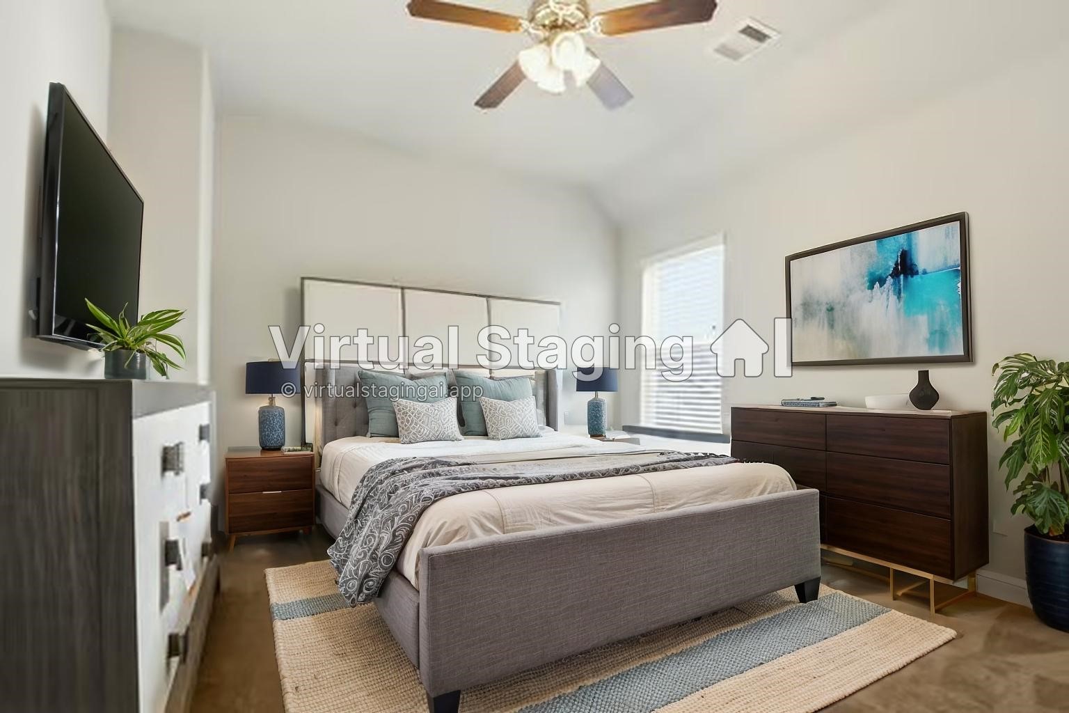24714 Longwood Forest Drive Spring, TX 77373 - Photo 14 of 21 This is a cozy, modern bedroom with a neutral color palette. It features a double bed, stylish furniture, a ceiling fan, and natural light from a large window. The room is enhanced by decor elements like plants and artwork.