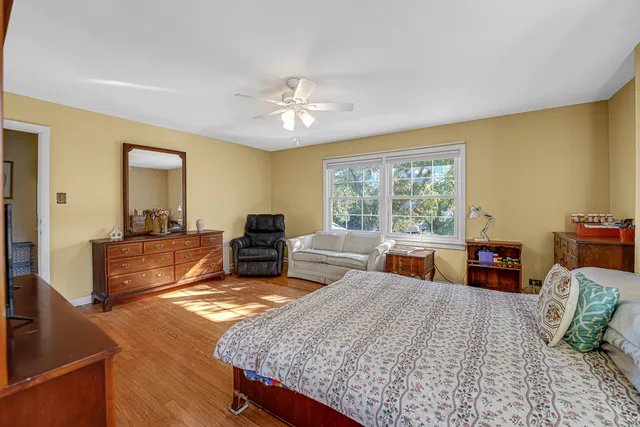 a bed room with a bed and a couch