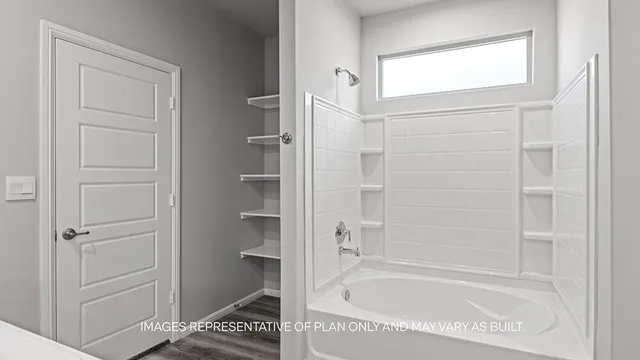 a bathroom with a bathtub