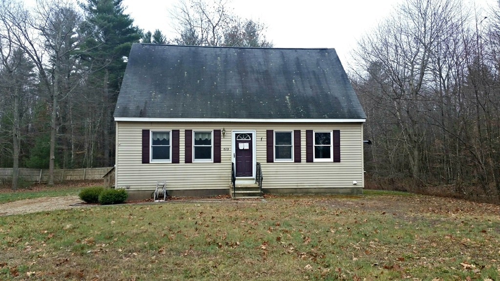 673 Old Petersham Road Barre, MA 01005 - Photo 1 of 19 a house view with a garden space