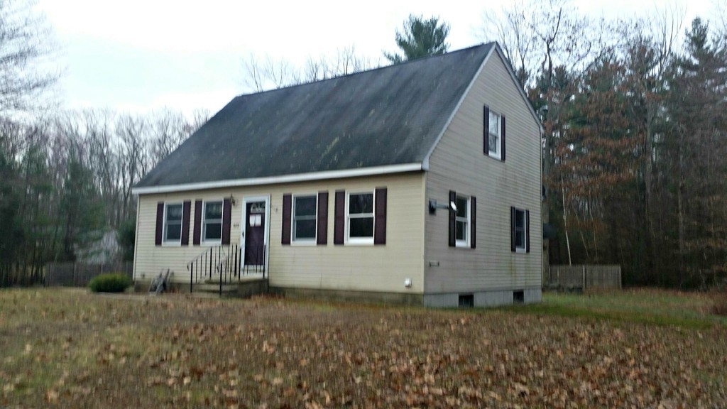 673 Old Petersham Road Barre, MA 01005 - Photo 14 of 19 a house that has a tree in front of it