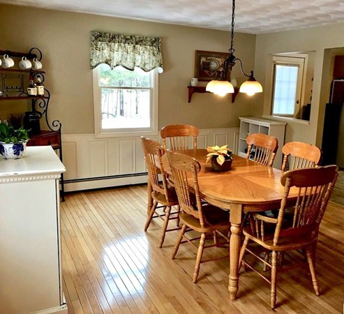 673 Old Petersham Road Barre, MA 01005 - Photo 6 of 19 a dining room with furniture and wooden floor