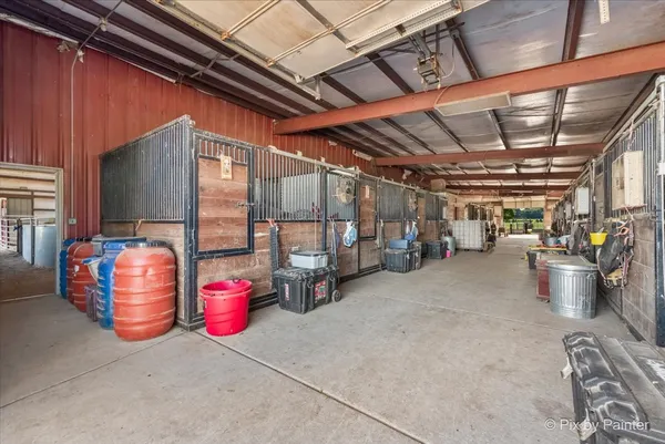a view of water heater room with stairs