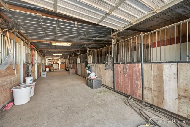 a view of an empty room with wooden roof