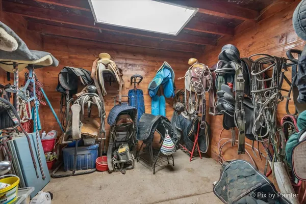 an aerial view of a houses with outdoor space and a lake view