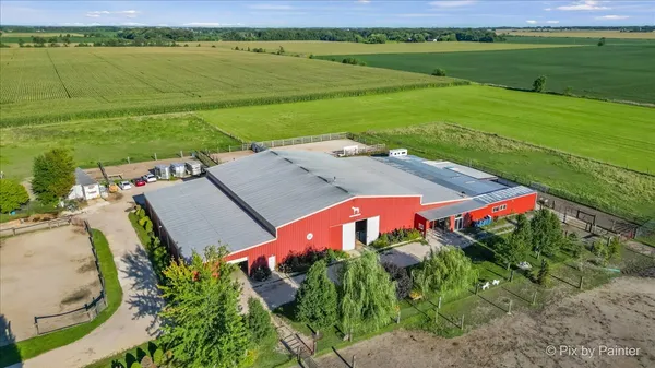 a view of a lake with a house in the background