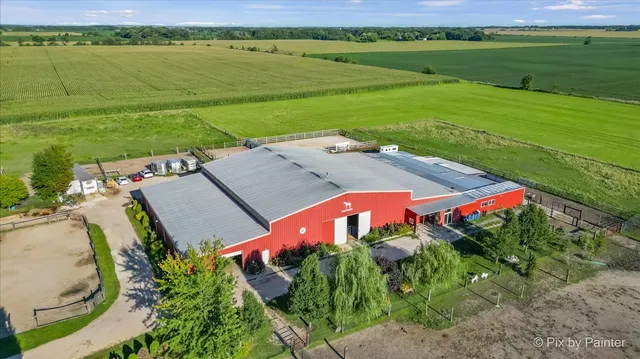 a view of a lake with a house in the background
