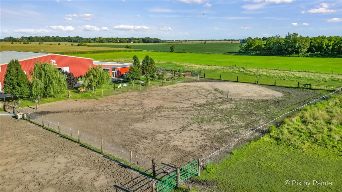 5-n487 County Line Road Maple Park, IL 60151 - Photo 21 of 44 a view of a lake with a house in the background