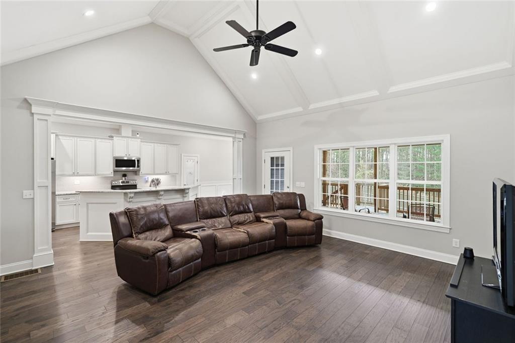 1006 Owens Store Road Canton, GA 30115 - Photo 6 of 48 a living room with furniture and a large window