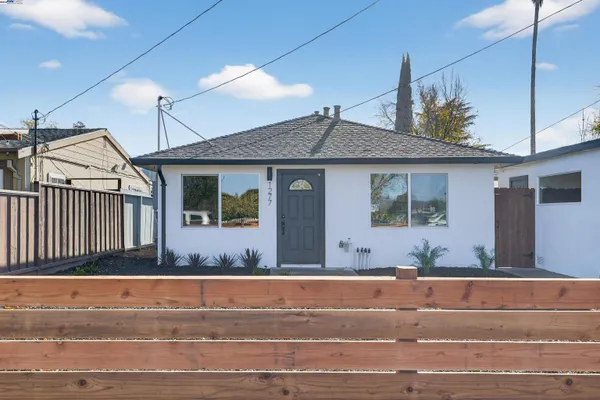 a front view of a house with a porch