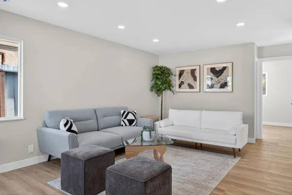 a living room with furniture and a couch