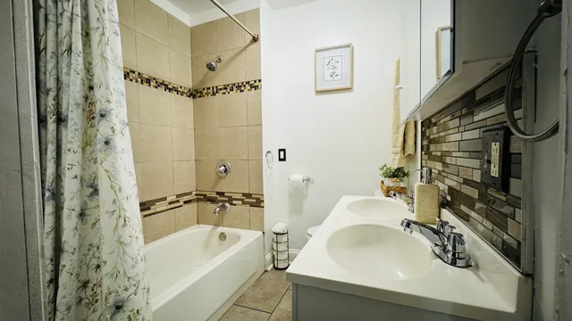 a bathroom with a sink and a bathtub