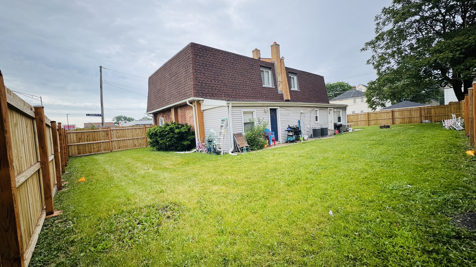 2420 Randolph Street Bellwood, IL 60104 - Photo 12 of 13 a view of a house with backyard and garden