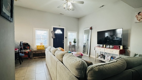 2420 Randolph Street Bellwood, IL 60104 - Photo 5 of 13 a living room with furniture and a flat screen tv