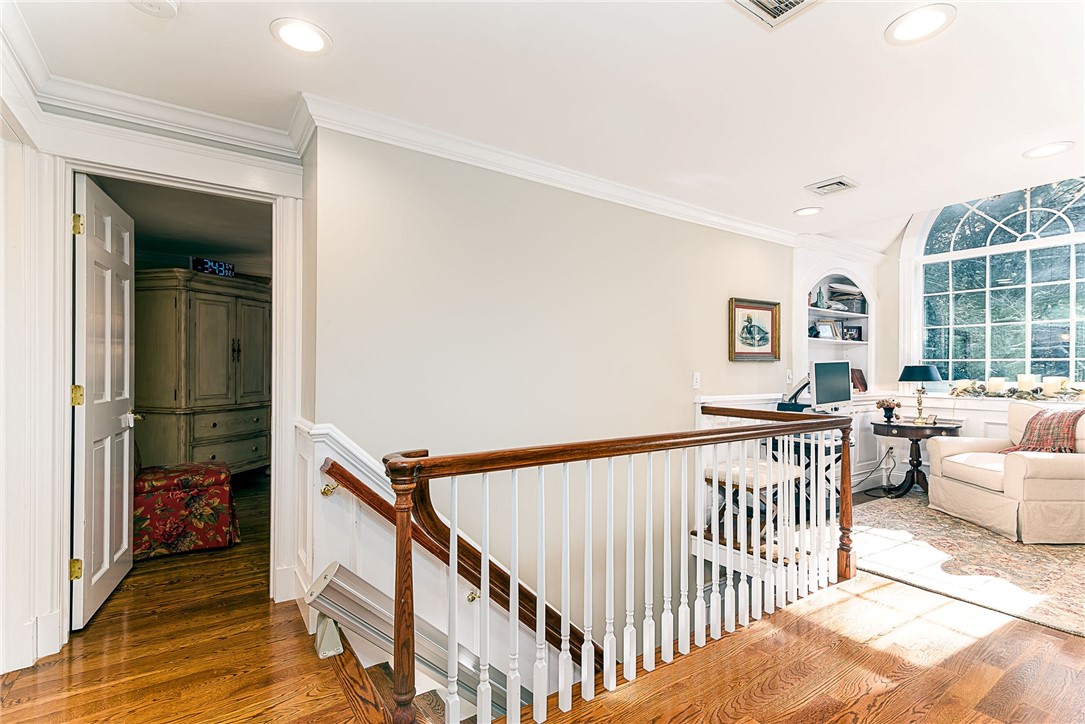 31 Raccoon Hill Road West Greenwich, RI 02817 - Photo 21 of 48 Second floor stairway with sitting room