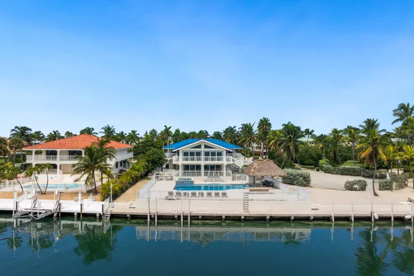 a view of a swimming pool and lounge chair