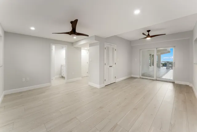 a view of a city with lawn chairs