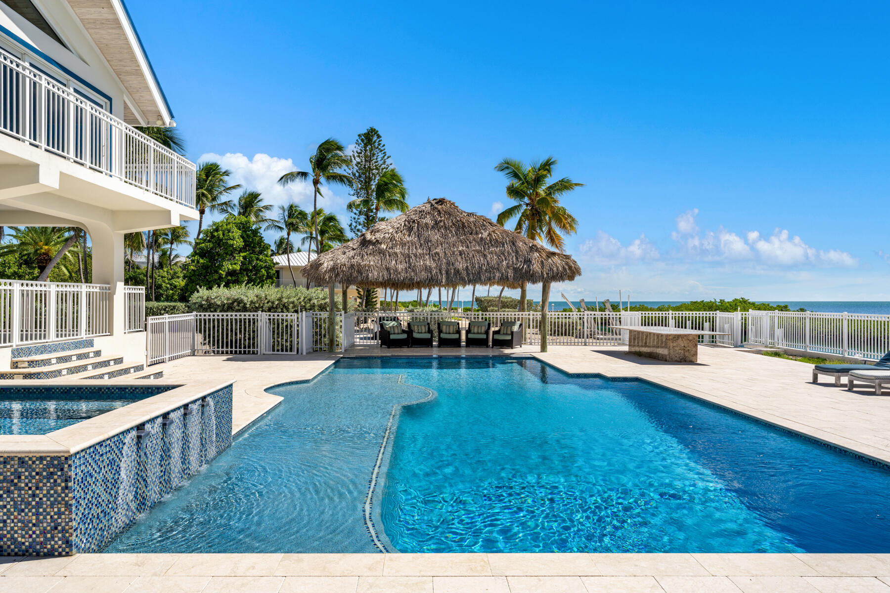 308 Sabal Street Duck Key, FL 33050 - Photo 5 of 87 a view of a house with swimming pool and sitting area