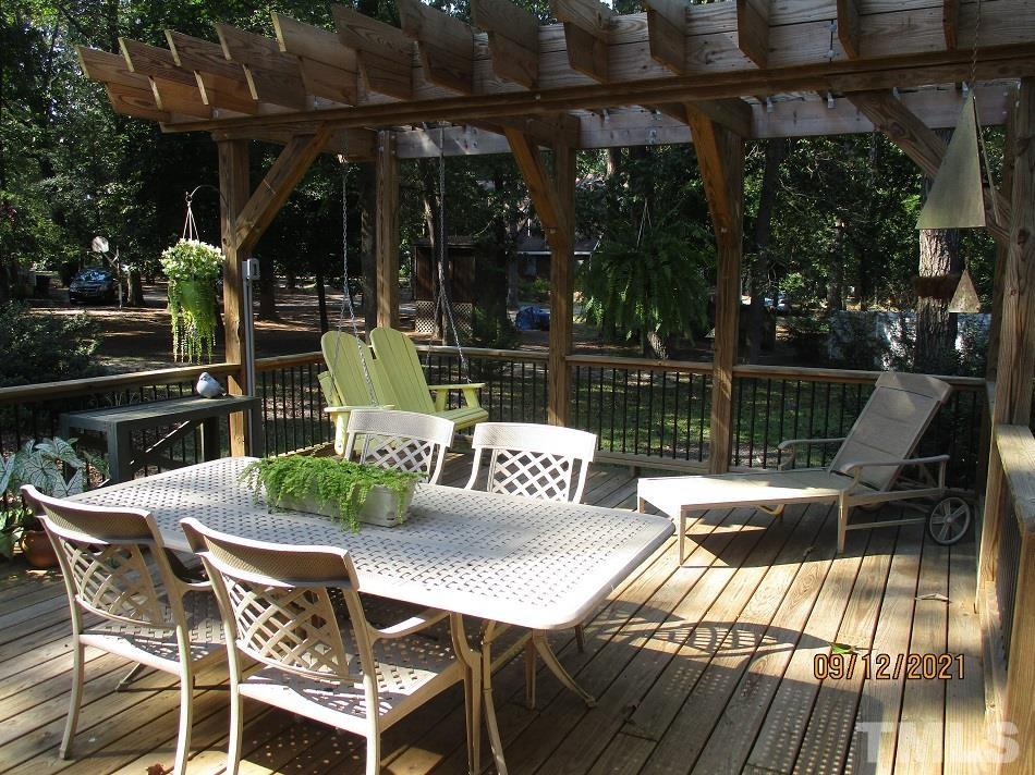91 Boykin Road Clinton, NC 28328 - Photo 15 of 17 a view of a chairs and table on the wooden deck