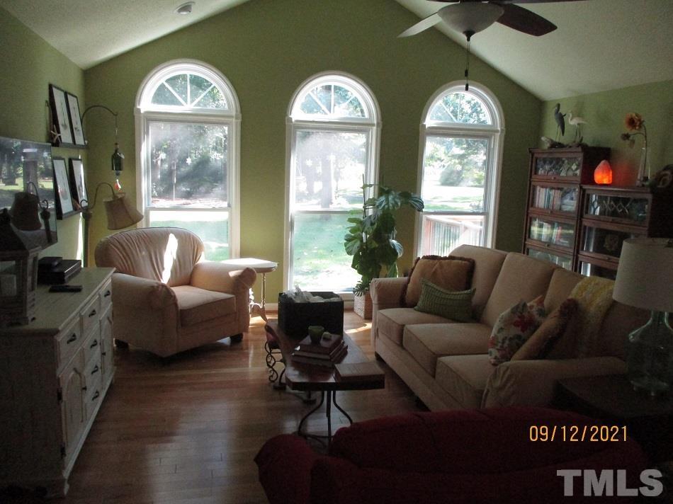 91 Boykin Road Clinton, NC 28328 - Photo 4 of 17 a living room with furniture and a large mirror