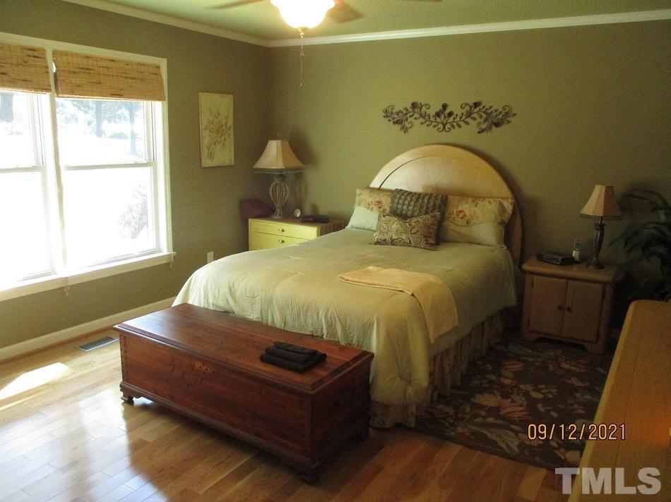 91 Boykin Road Clinton, NC 28328 - Photo 7 of 17 a bedroom with a bed and a window
