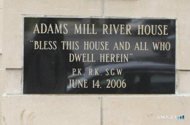 25 Adams Avenue, Unit 112 Stamford, CT 06902 - Photo 3 of 17 a street sign on a wall