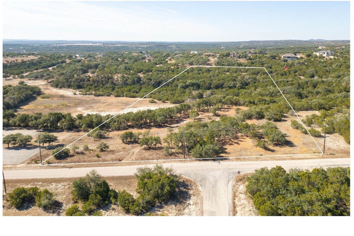 78 Dodder Lane Spring Branch, TX 78070 - Photo 5 of 24 Aerial view of property and surrounding area featuring property parcel outlined