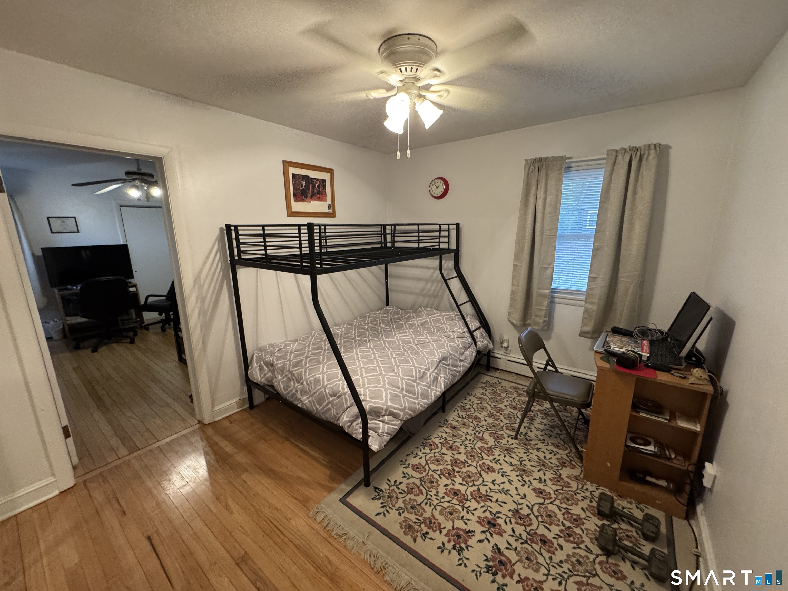 90 Larchmont Avenue Waterbury, CT 06708 - Photo 13 of 26 a living room with furniture