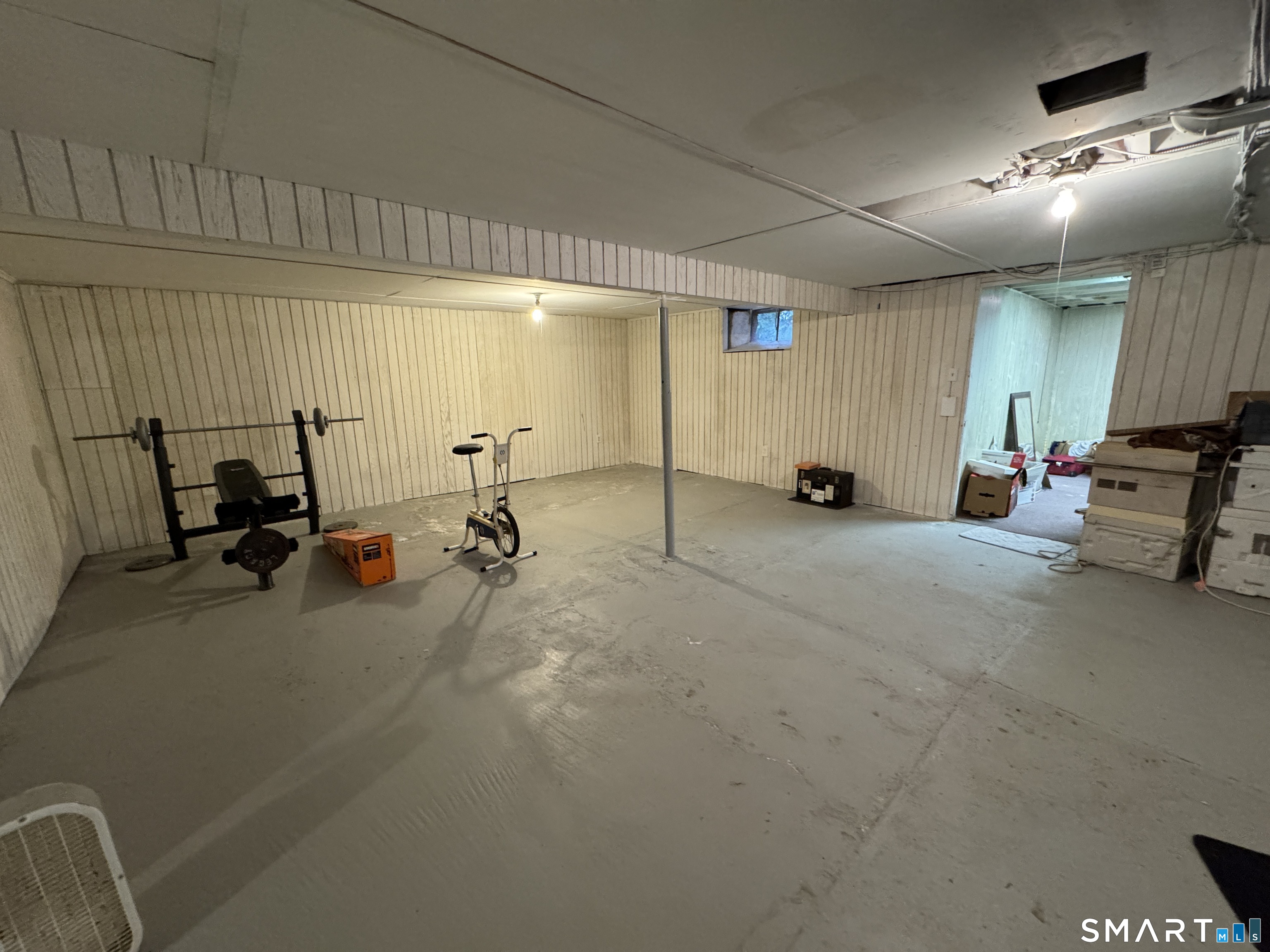 90 Larchmont Avenue Waterbury, CT 06708 - Photo 18 of 26 a view of a room with gym equipment