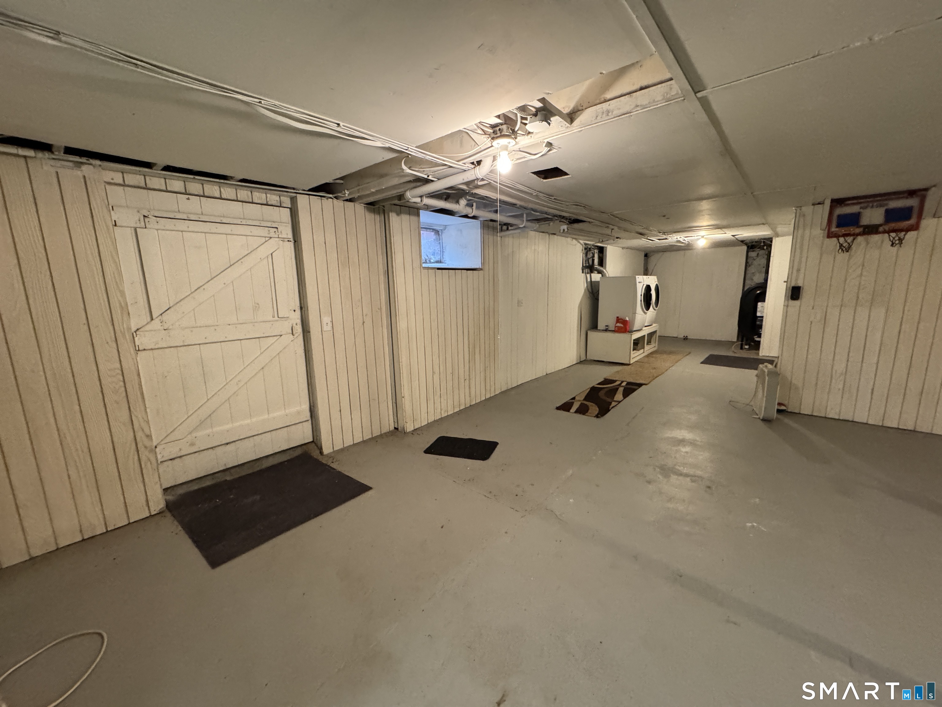 90 Larchmont Avenue Waterbury, CT 06708 - Photo 20 of 26 a view of a room with gym equipment