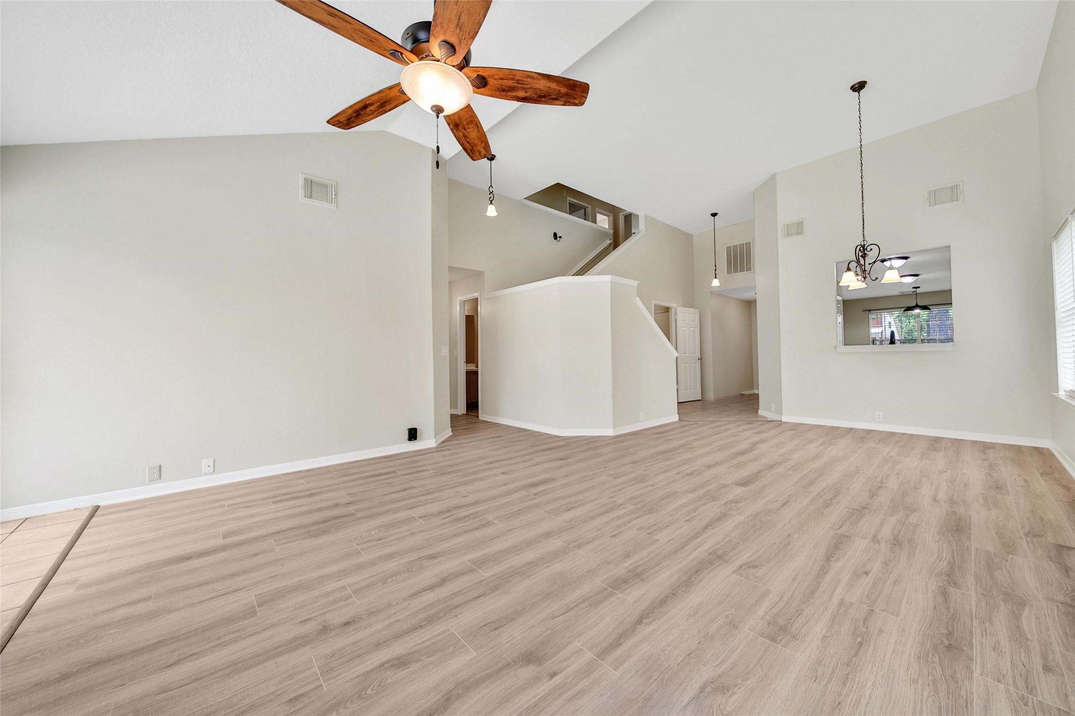 11911 Ezekiel Road Tomball, TX 77375 - Photo 13 of 23 Spacious family room with high ceilings and plenty of space for gatherings.