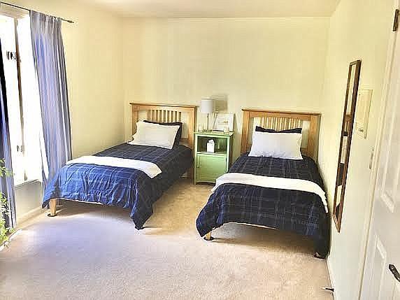 11394 Saddle Road Monterey, CA 93940 - Photo 13 of 33 a bedroom with bed and a window