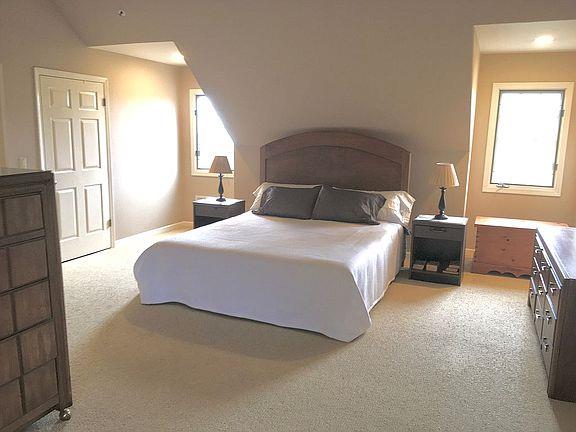 11394 Saddle Road Monterey, CA 93940 - Photo 6 of 33 a bedroom with a bed and a window