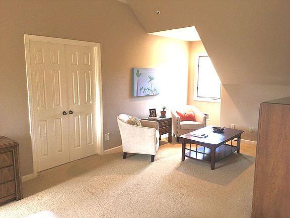11394 Saddle Road Monterey, CA 93940 - Photo 7 of 33 a living room with furniture and a window