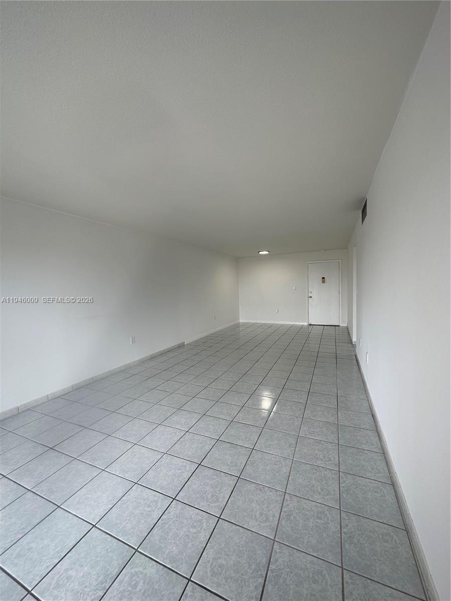 4670 West 13th Lane, Unit 405 Hialeah, FL 33012 - Photo 11 of 16 a view of a room