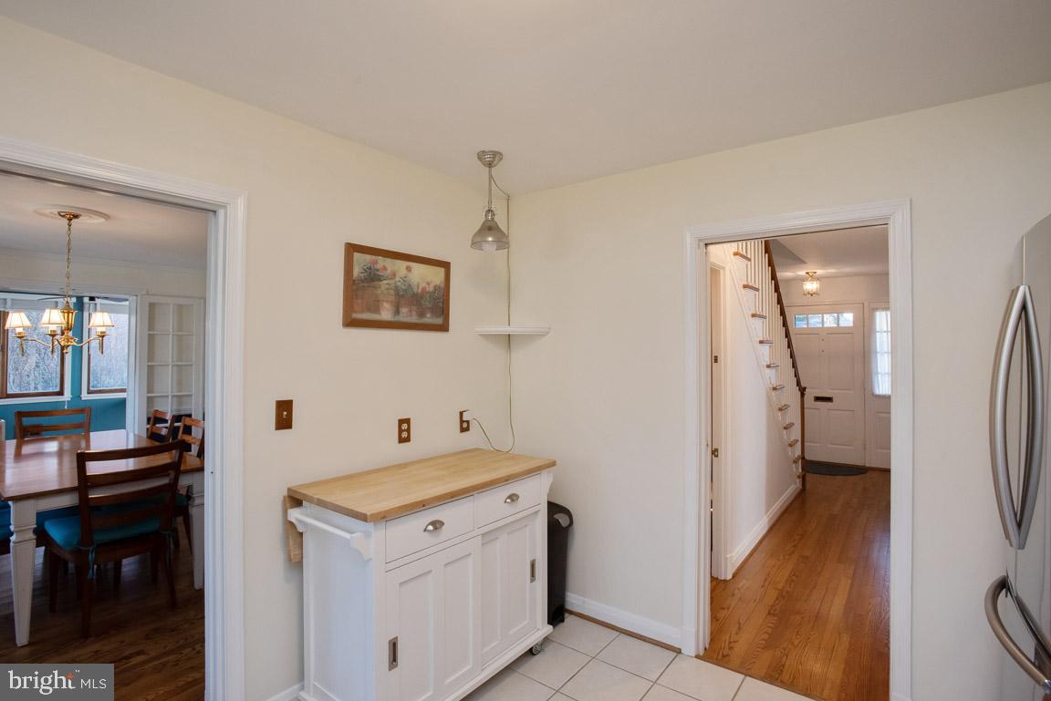 304 Cedarcroft Road Baltimore, MD 21212 - Photo 15 of 39 a kitchen with a refrigerator and a stove
