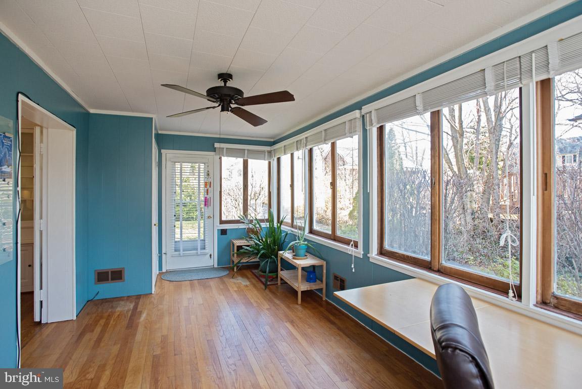 304 Cedarcroft Road Baltimore, MD 21212 - Photo 17 of 39 a living room with furniture and a large window