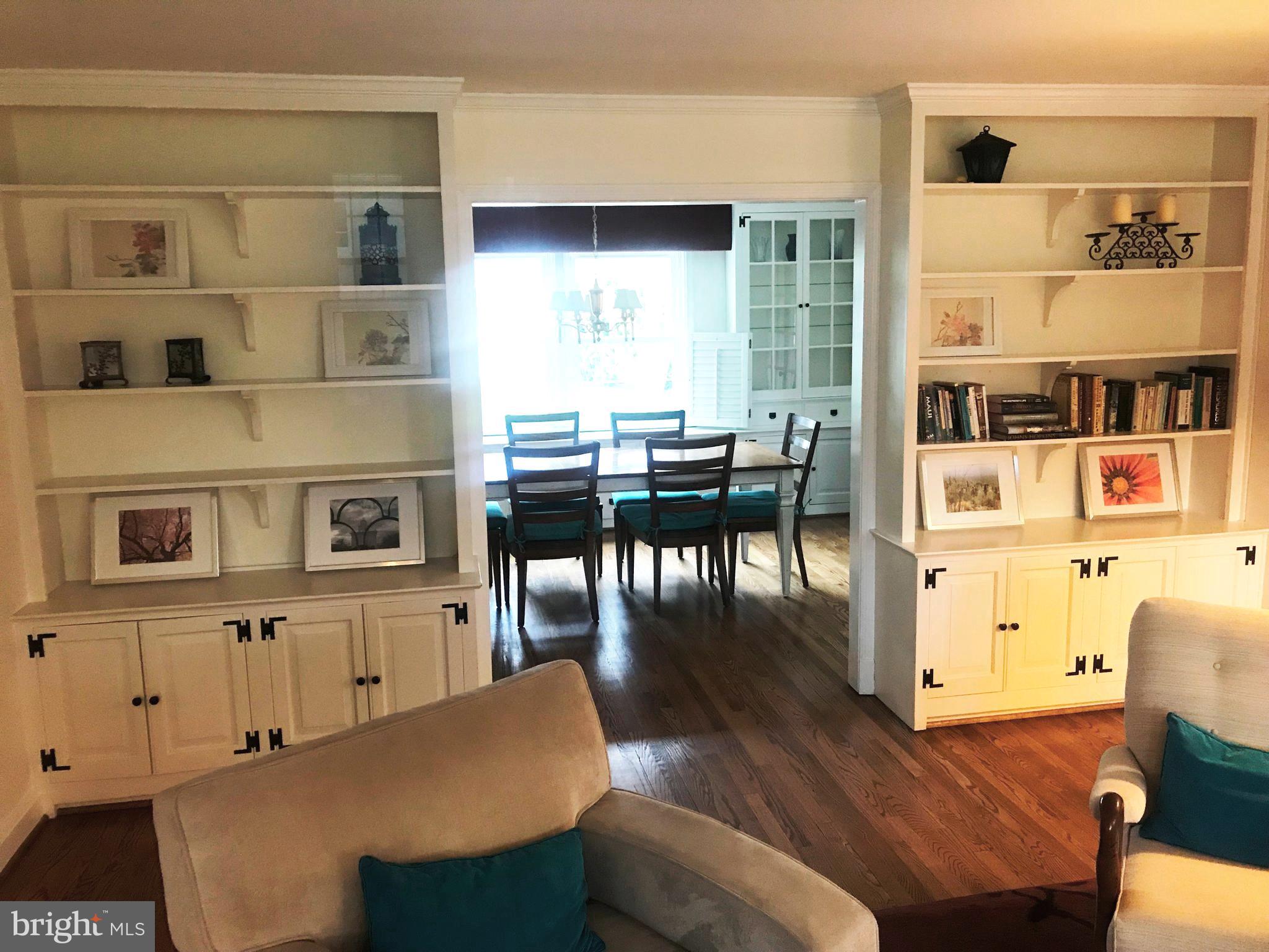 304 Cedarcroft Road Baltimore, MD 21212 - Photo 9 of 39 a dining room with furniture and wooden floor