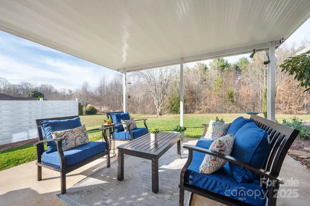 a outdoor living space with furniture and garden view