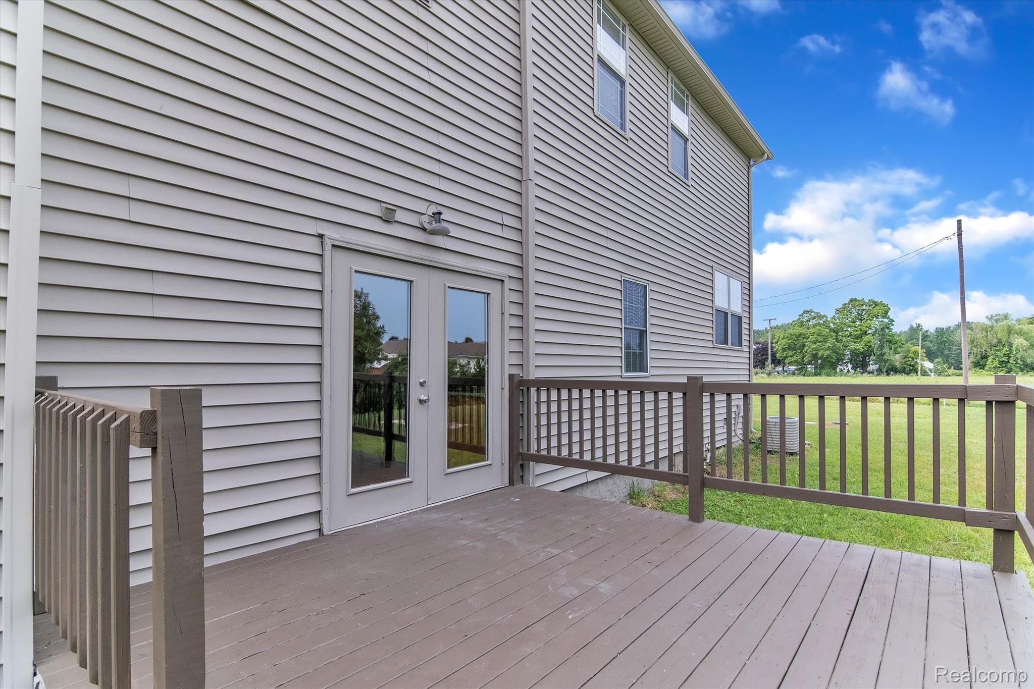 7574 Stout Road Carleton, MI 48117 - Photo 24 of 30 Large Deck great for entertaining