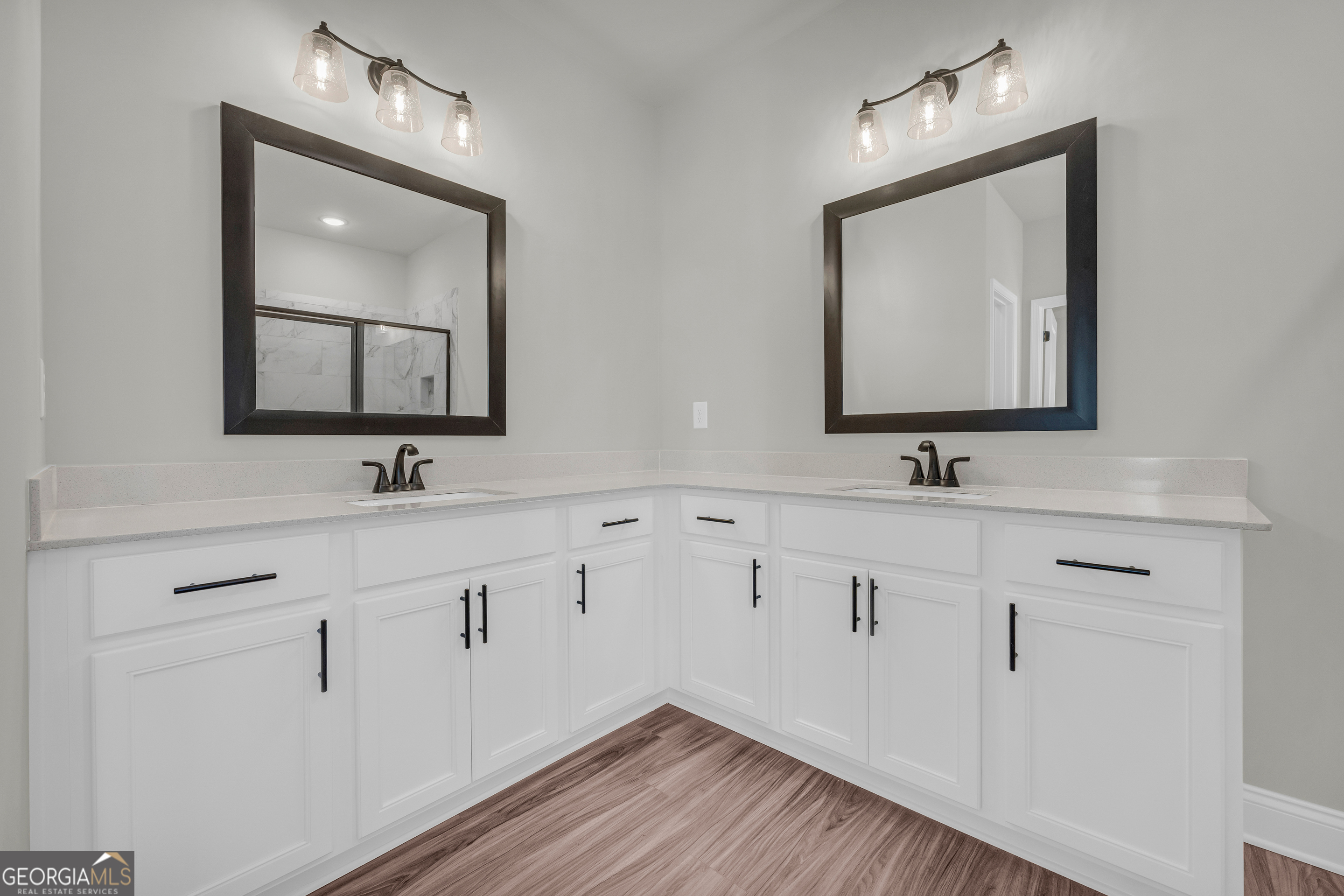 174 Old Milltown Road Hartwell, GA 30643 - Photo 35 of 53 a bathroom with double vanity sink a mirror and vanity