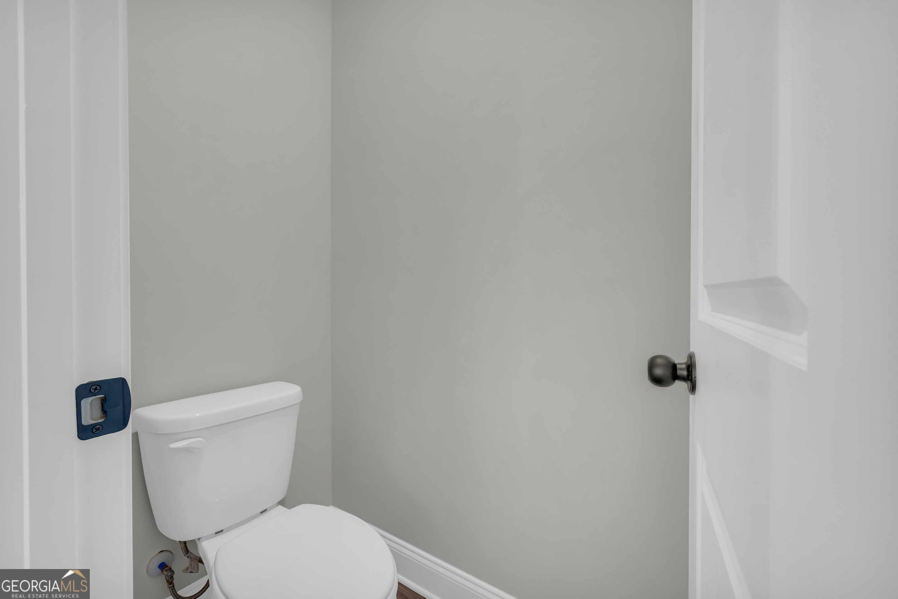 174 Old Milltown Road Hartwell, GA 30643 - Photo 37 of 53 a white toilet sitting next to a shower