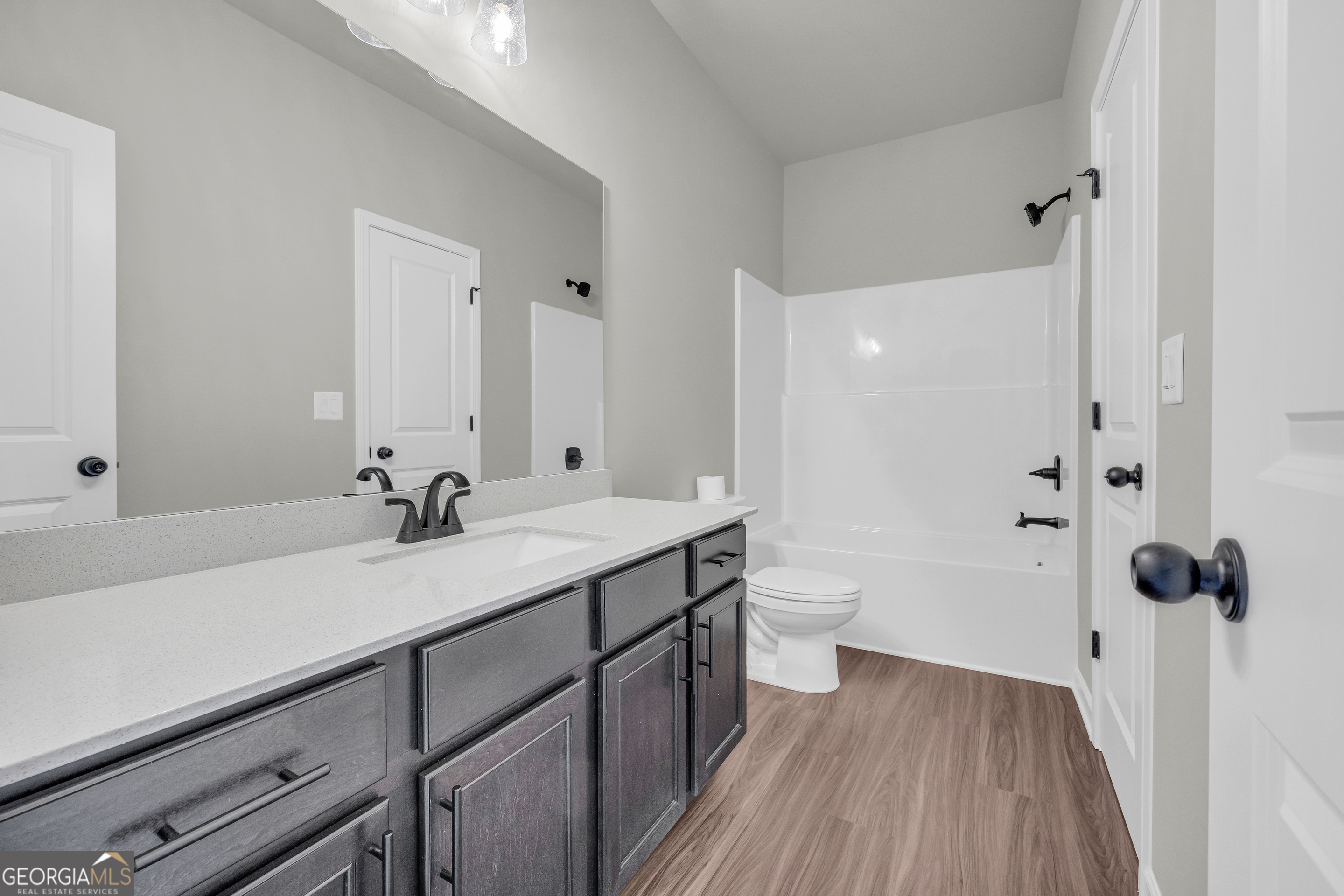 174 Old Milltown Road Hartwell, GA 30643 - Photo 44 of 53 a bathroom with a sink a toilet and shower