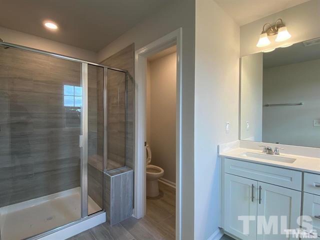 632 Gimari Drive Wake Forest, NC 27587 - Photo 15 of 18 a bathroom with a shower and a sink